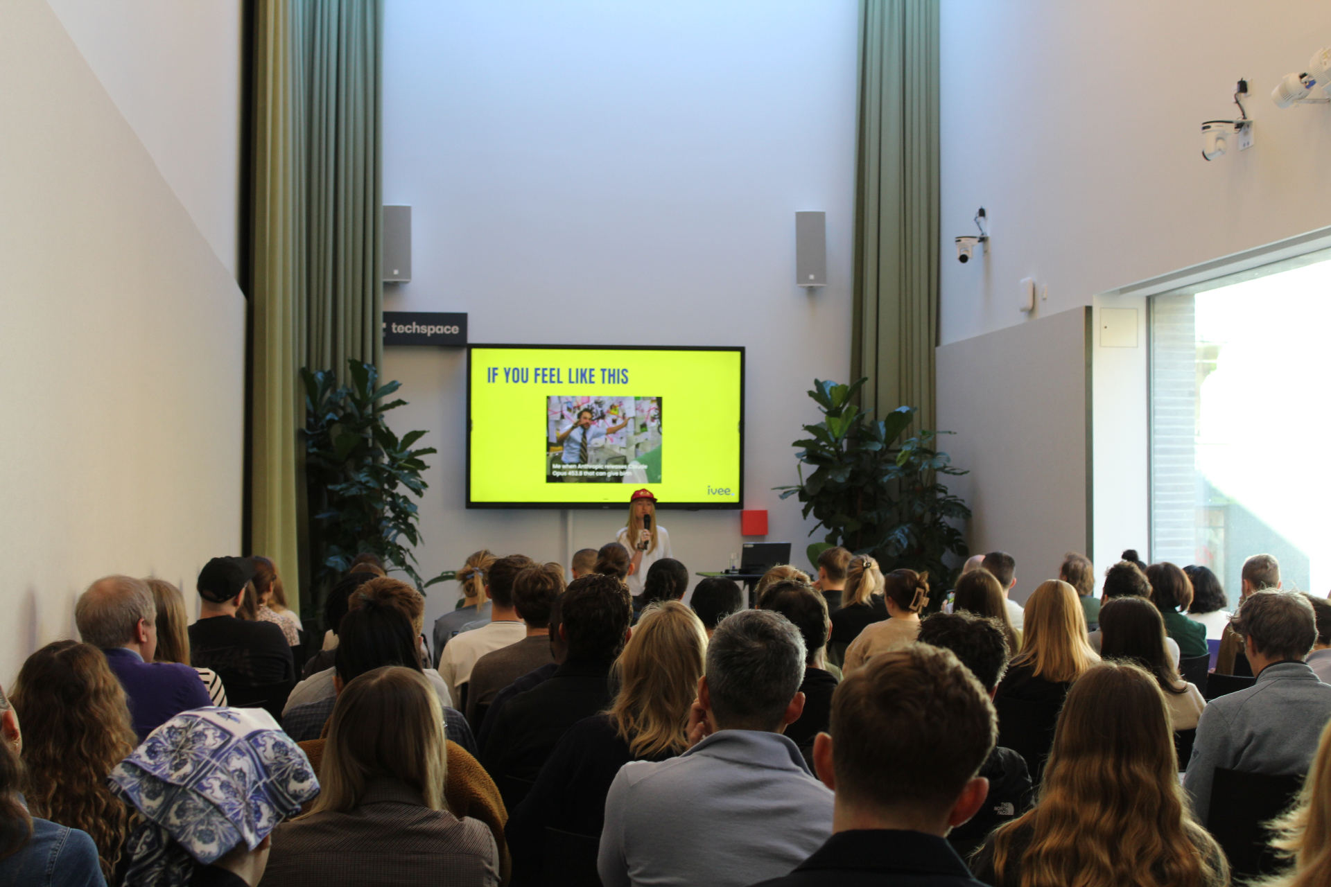 Amelia, ivee's founder, presenting the core programme to a packed room